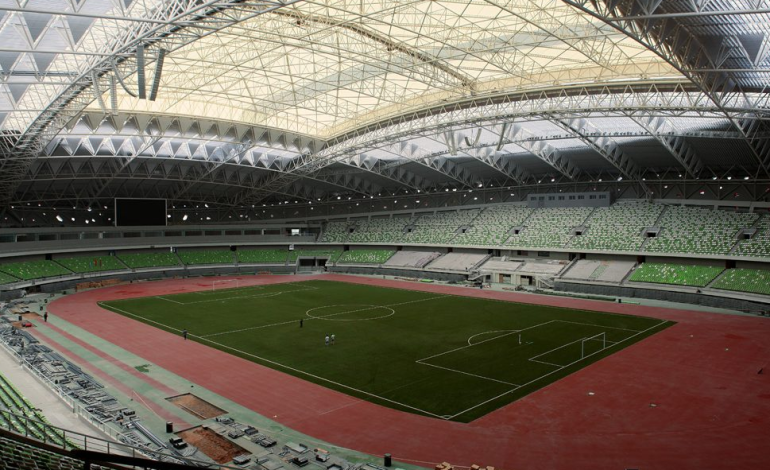 How much does an artificial turf football field cost?
